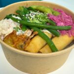 Seoul Born Born Identity Rice Bowl with Spring Rolls, Beans, Red Cabbage and Edamame beans