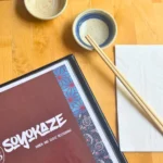 Soyokaze menu on a table with some chopsticks