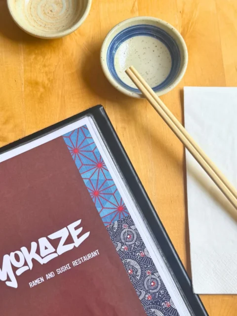 Soyokaze menu on a table with some chopsticks