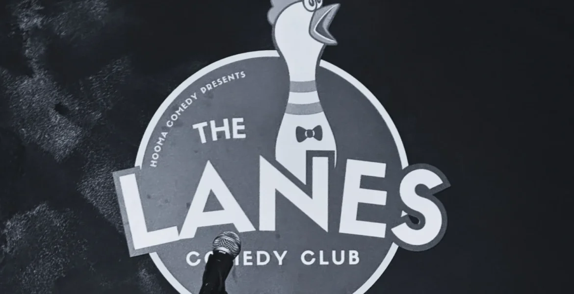 The Lanes Comedy Club Logo with microphone